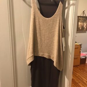 Dress with top over light weight dress underneath.